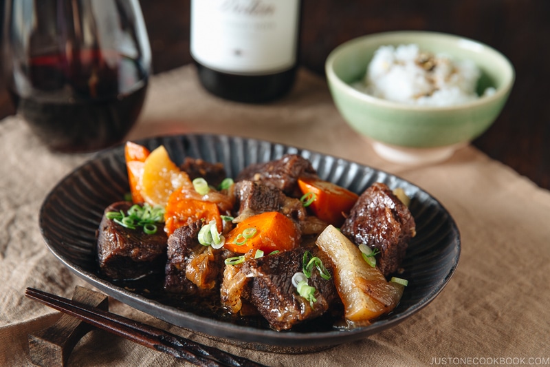 Pressure Cooker Short Ribs on a dark plate.