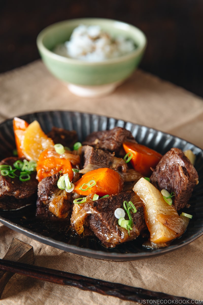 Pressure Cooker Short Ribs on a dark plate.
