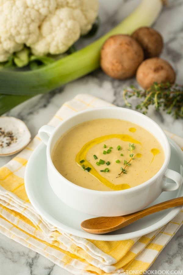Creamy Roasted Cauliflower Soup in a soup bowl.