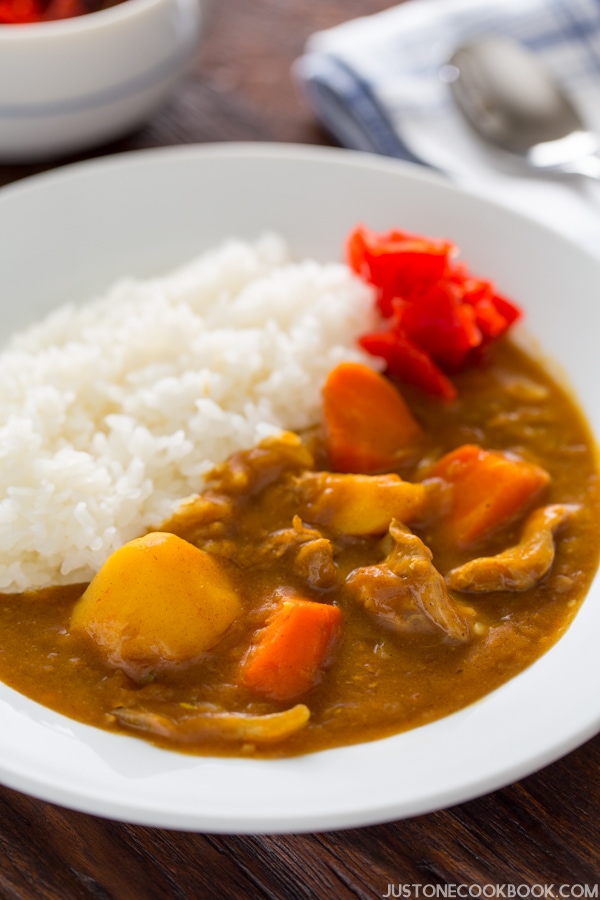 Pressure Cooker Japanese Curry and white rice in a bowl.