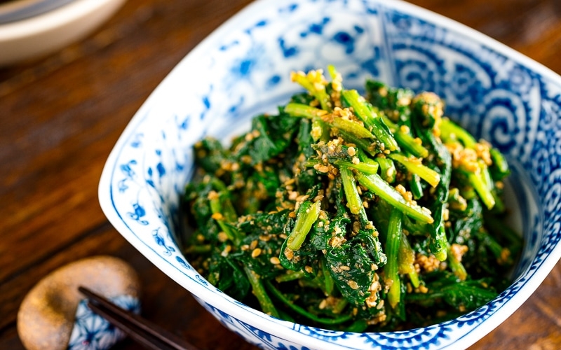 Japanese spinach salad dressed in sesame sauce served in a bowl
