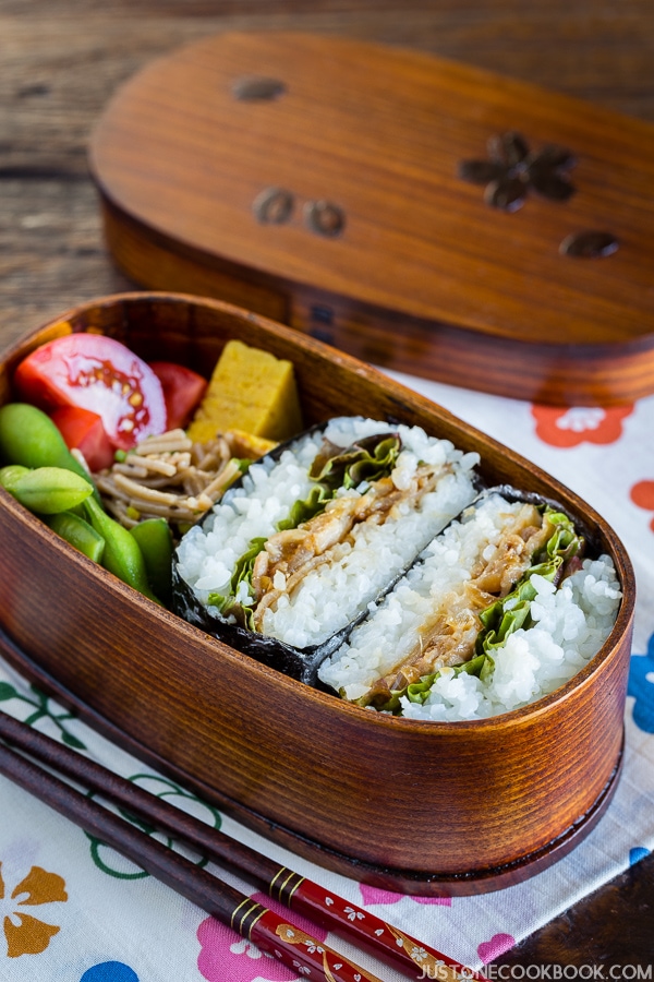 Ginger Pork Onigirazu in a bento box.