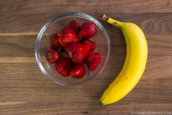 fresh strawberry and banana on a table.