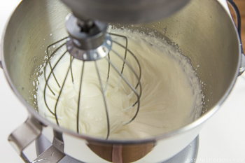 Fresh whipped cream in a mixer.