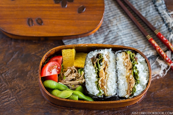 Ginger Pork Onigirazu in a bento box.