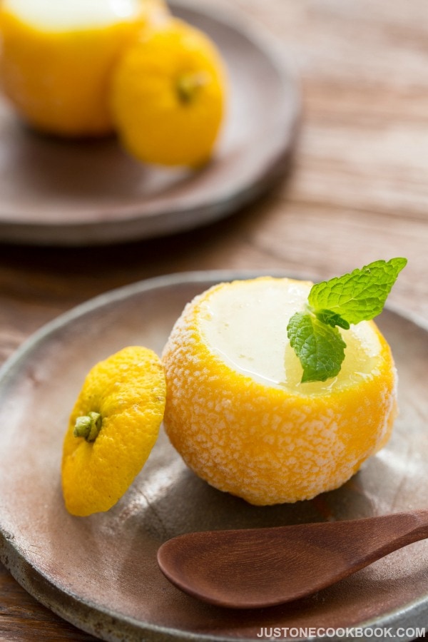 Yuzu Sorbet with garnish mint leaves on top.