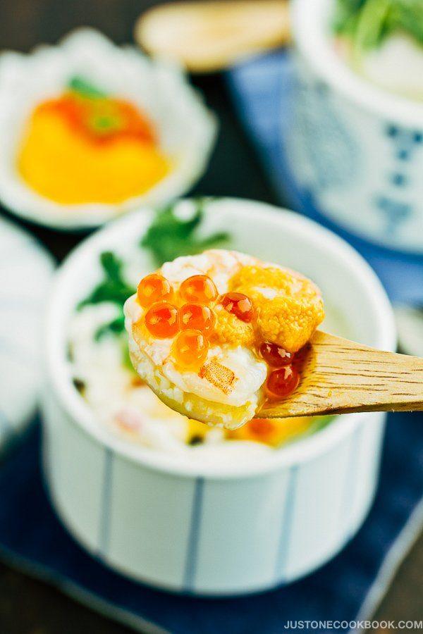 Chawanmushi with Shrimp with uni and ikura on a spoon.