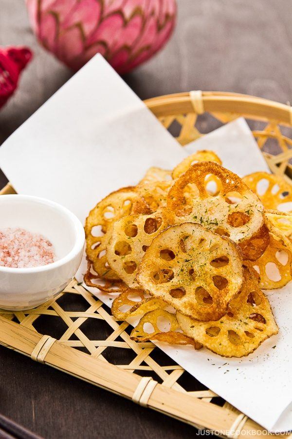 Lotus Root Chips on a bamboo basket.