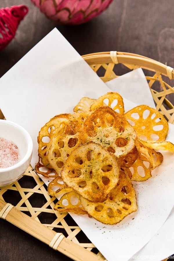 Lotus Root Chips, Renkon Chips on a bamboo basket. 