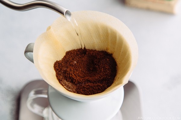 Japanese Iced Coffee with coffee filter on a table.