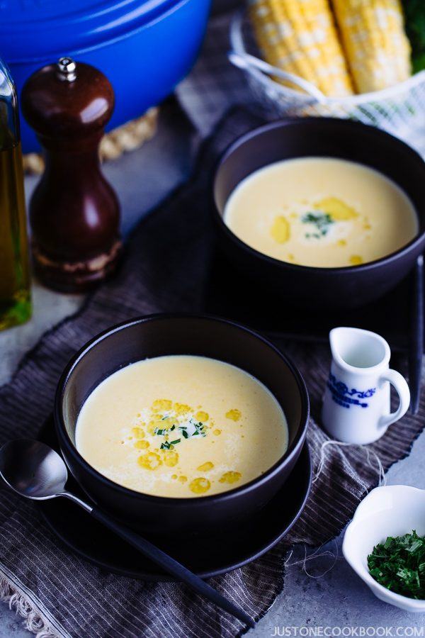 Corn Potage in two bowls on a table.