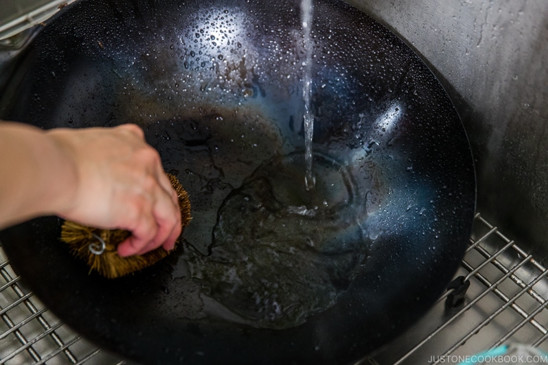 washing a wok in the sink - How to Season a Wok | www.justonecookbook.com