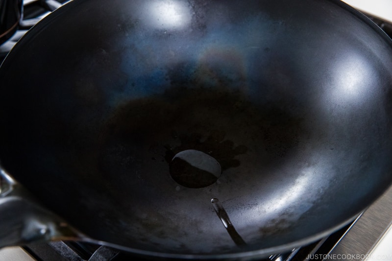 oil inside a wok - How to Season a Wok | www.justonecookbook.com
