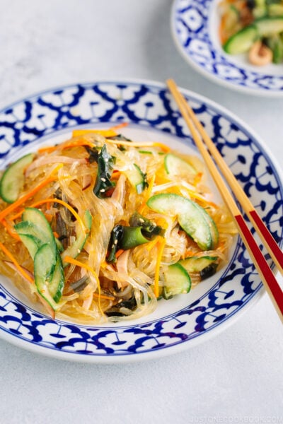 Japanese glass noodle salad consists of glass noodles, cucumber, wakame, carrots, and ham