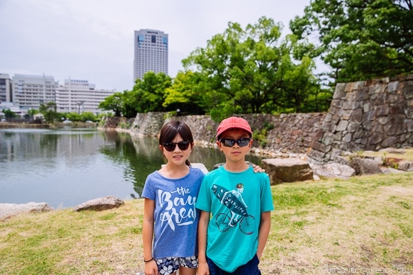 children standing in front of Hiroshima Castle wall | JustOneCookbook.com