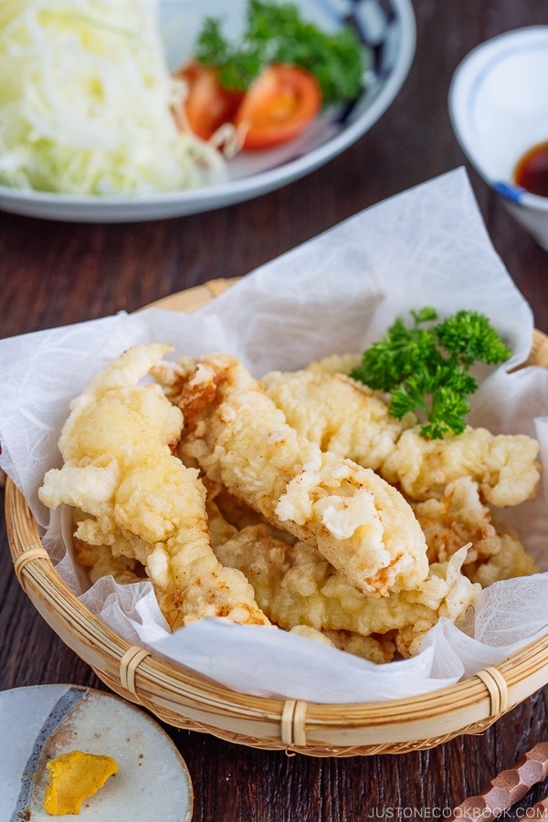 Chicken Tempura (Toriten) in a bamboo basket, served with ponzu sauce and Japanese hot mustard karashi.