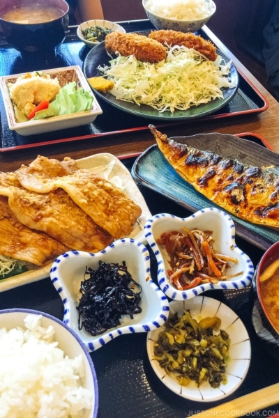 Japanese lunch meal set with ginger pork, grilled mackerel and korokke.