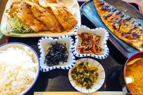 Japanese lunch meal set with ginger pork, grilled mackerel and korokke.