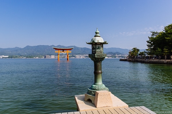 view of stone lantern and torii gate | JustOneCookbook.com