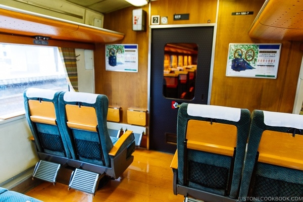 inside of Yufu limited express train - Yufuin Travel Guide | justonecookbook.com