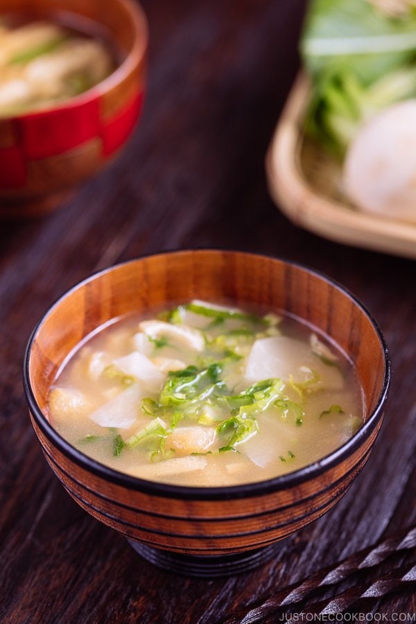 Japanese turnip miso soup in a wooden bowl.