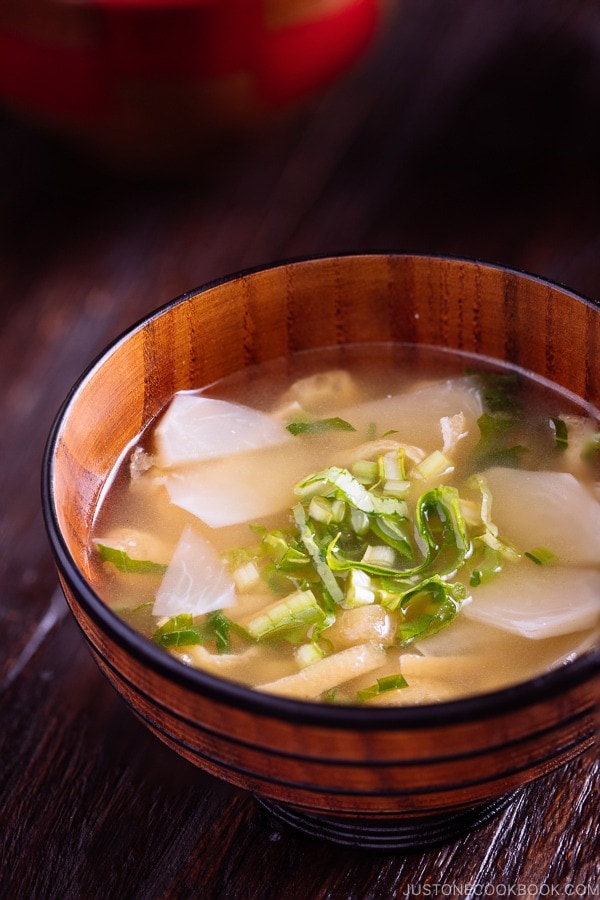 Japanese turnip miso soup in a wooden bowl.