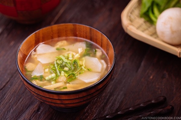 Japanese turnip miso soup in a wooden bowl.