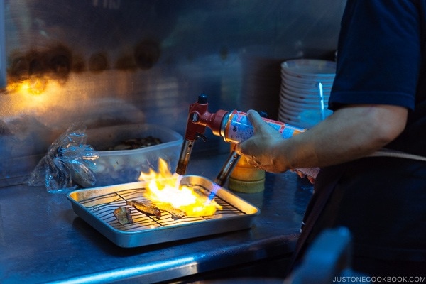 Pork being seared at Hakata Daruma - Fukuoka Travel Guide | justonecookbook.com