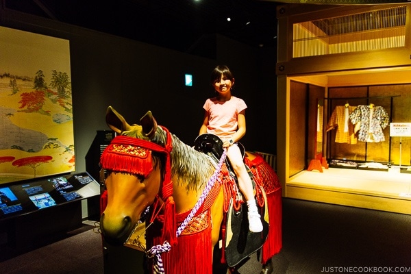 child on horse display at Wakuwakuza History and Cultural Experience - Kumamoto Travel Guide | justonecookbook.com