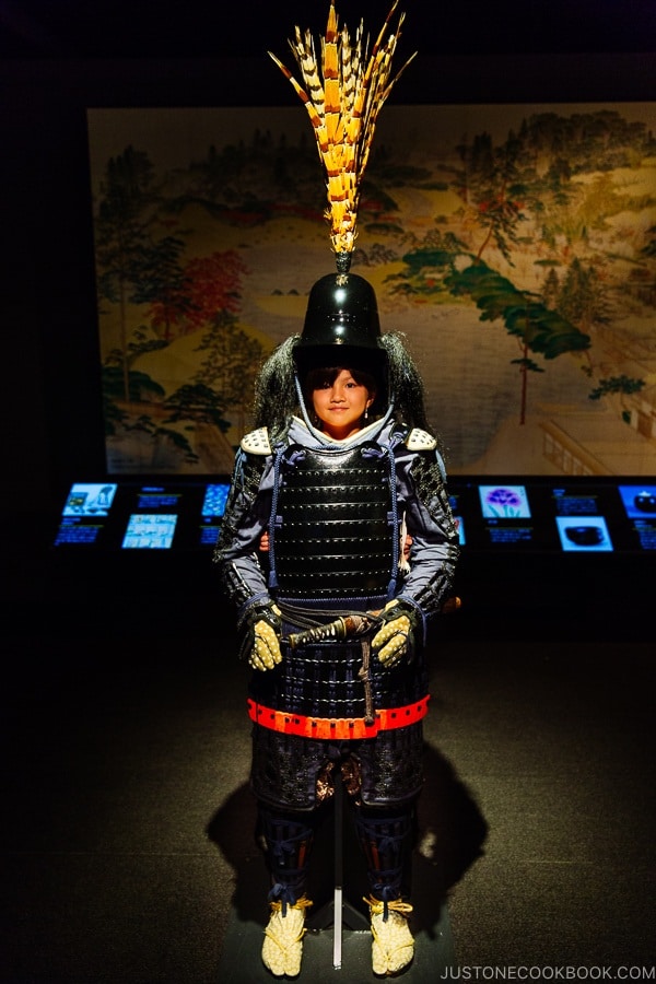 child inside samurai model Wakuwakuza History and Cultural Experience - Kumamoto Travel Guide | justonecookbook.com