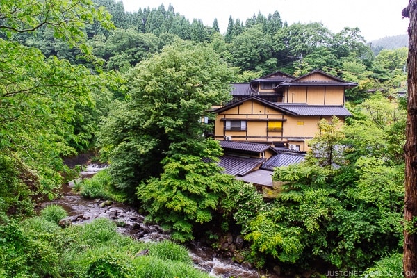 forest, river, and hotel view Kurokawa Onsen Travel Guide | justonecookbook.com