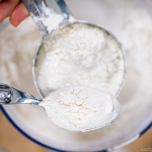 Measuring the flour accurately with a measuring cup.