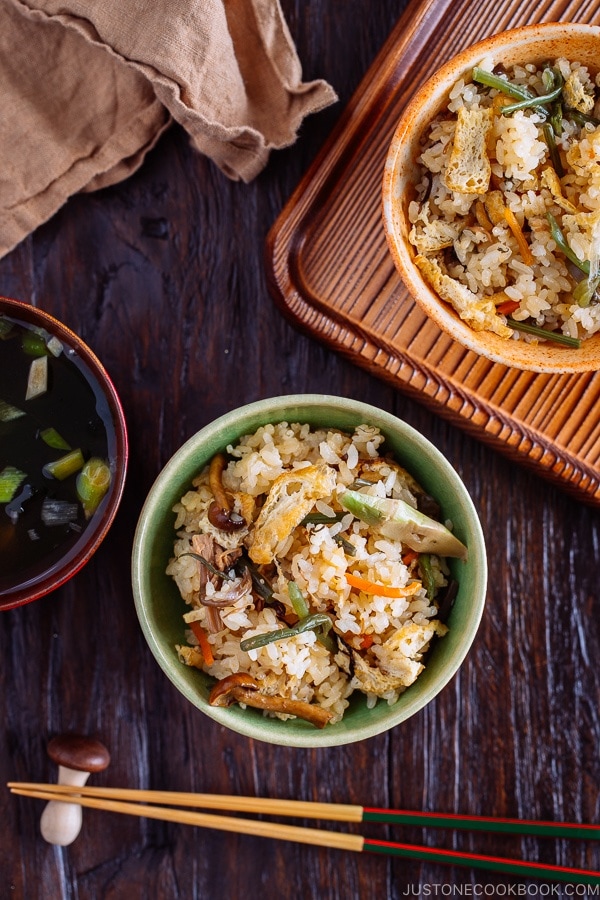 Rice with Mountain Vegetables (Sansai Gohan) served in a green ceramic bowl.