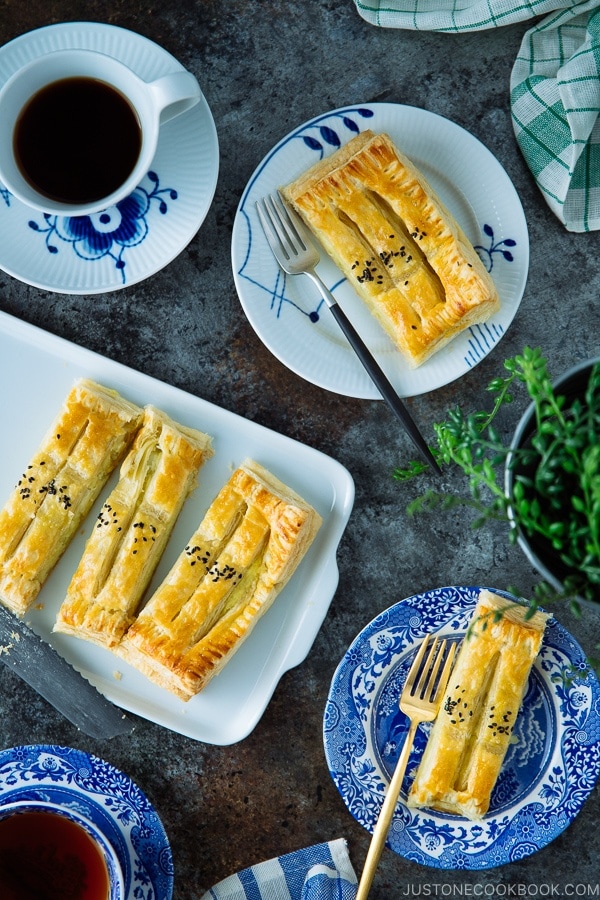 Japanese sweet potato pie/puff pastry is on a white plate.