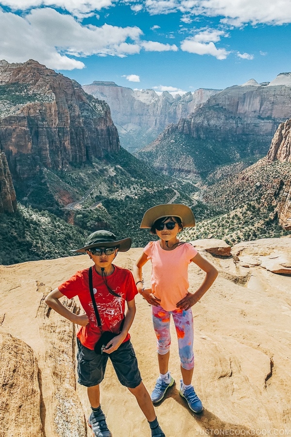 children standing at the end of the Canyon Overlook Trail - Zion National Park Travel Guide | justonecookbook.com