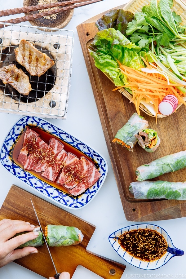 Fresh spring rolls with Yakiniku (Japanese BBQ) and julienned vegetables and fresh herbs along with homemade Yakiniku Sauce.