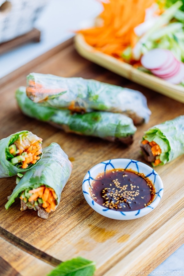 Fresh spring rolls with Yakiniku (Japanese BBQ) and julienned vegetables and fresh herbs along with homemade Yakiniku Sauce.