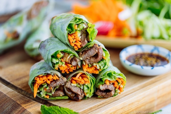 Fresh spring rolls with Yakiniku (Japanese BBQ) and julienned vegetables and fresh herbs along with homemade Yakiniku Sauce.