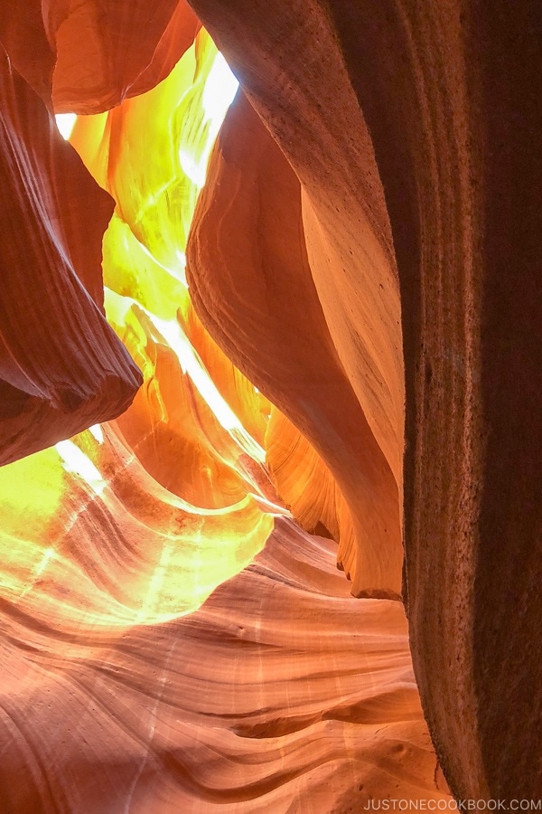 sand rock formation looking up into the sky - Lower Antelope Canyon Photo Tour | justonecookbook.com