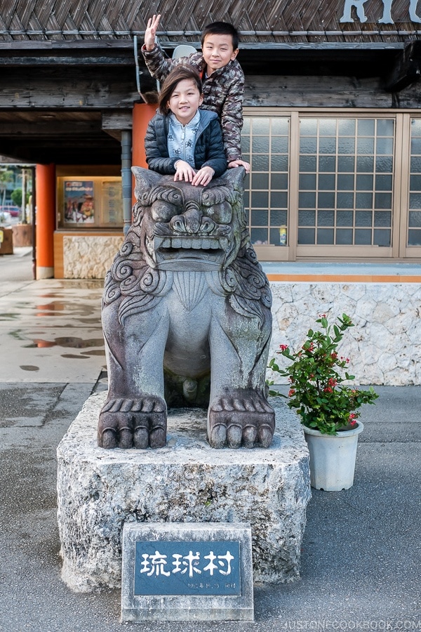 Just One Cookbook children on shisa statue at Okinawa Ryukyu Village | justonecookbook.com