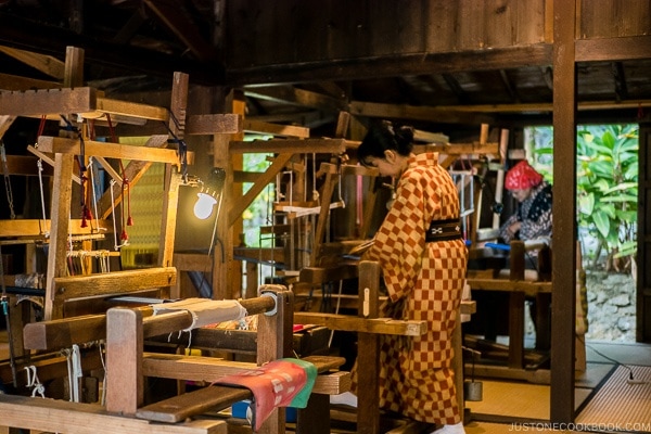 women performing traditional weaving at Ryukyu Mura Okinawa | justonecookbook.com