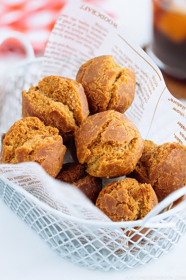 Sata Andagi (Okinawan Doughnuts) in a white basket.