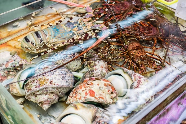 vendor selling seafood at First Makishi Public Market - Okinawa Travel Guide | justonecookbook.com