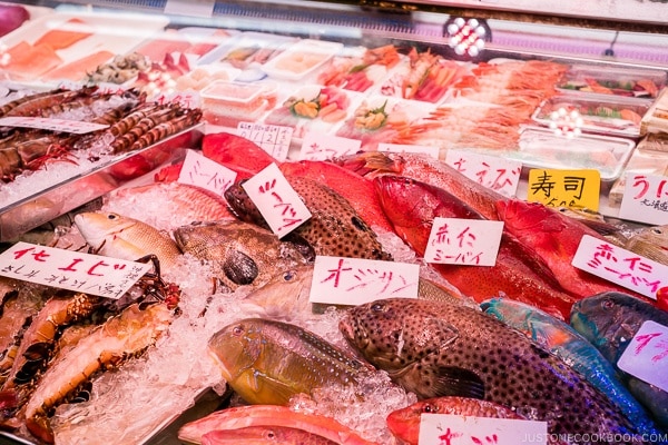 vendor selling seafood at First Makishi Public Market - Okinawa Travel Guide | justonecookbook.com