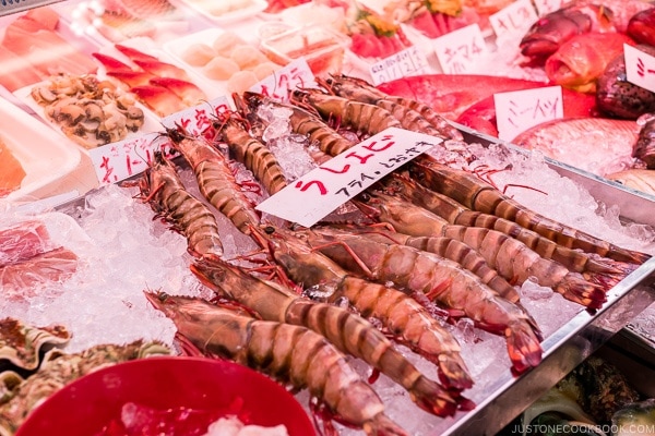 vendor selling seafood at First Makishi Public Market - Okinawa Travel Guide | justonecookbook.com