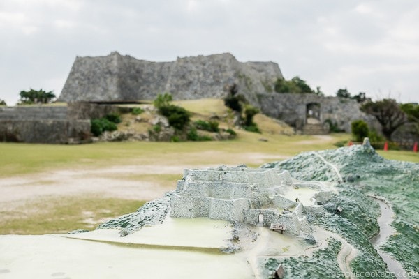 model of Nakagusuku Castle with the actual castle in the background - Okinawa Travel Guide | justonecookbook.com