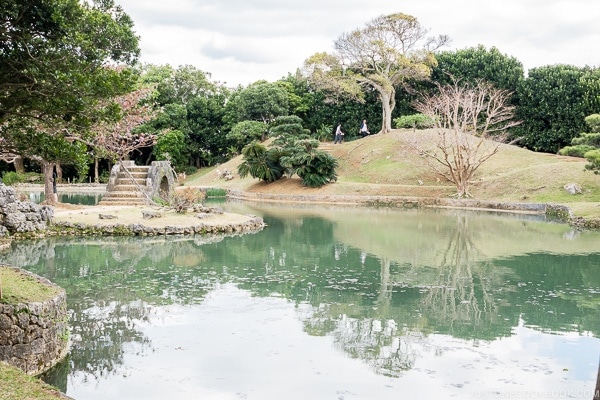 lake with stone bridge at Shikinaen - Okinawa Travel Guide | justonecookbook.com