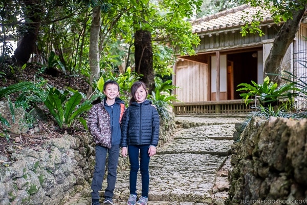 children on stone path at Shikinaen - Okinawa Travel Guide | justonecookbook.com