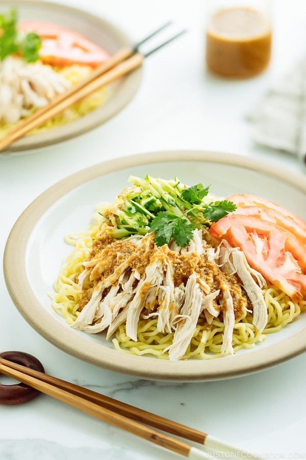 Cold Ramen - Hiyashi Chuka with Sesame Miso Sauce served with cucumbers, tomato, shredded blanched chicken.