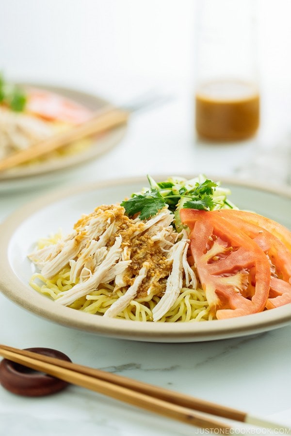 Cold Ramen - Hiyashi Chuka with Sesame Miso Sauce served with cucumbers, tomato, shredded blanched chicken.